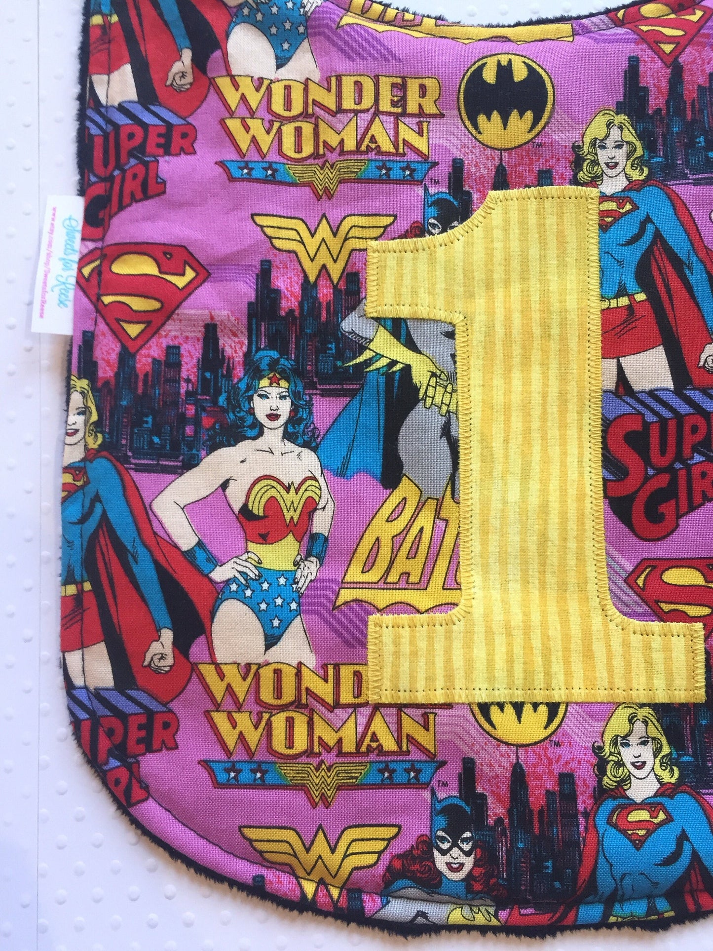 Superhero Girls (Wonder Woman, Batgirl, Supergirl) First Birthday Bib